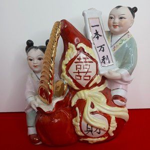Porcelain Chinese Prosperity Statue Pouring Lucky Coins Boy Girl Painted 7”